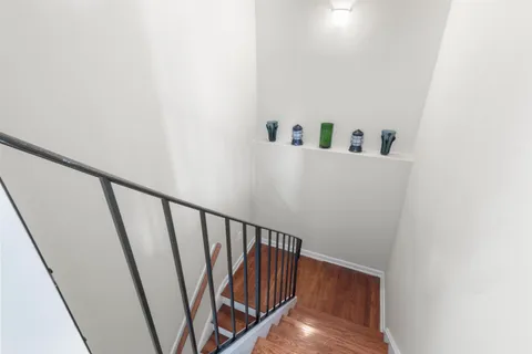 a bedroom with bed and window