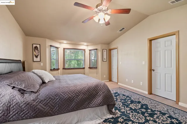 a view of a balcony with wooden fence and floor