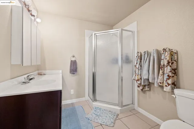 a backyard of a house with outdoor seating