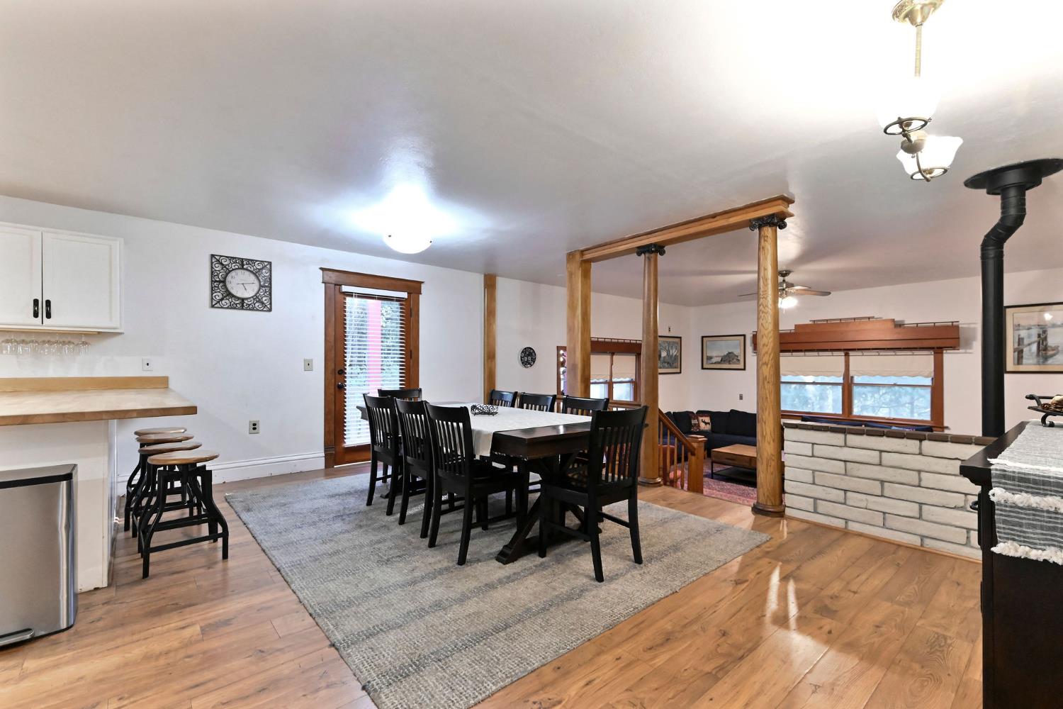 5276 Highway 4 Murphys, CA 95247 - Photo 13 of 69 a view of a dining room with furniture window and wooden floor