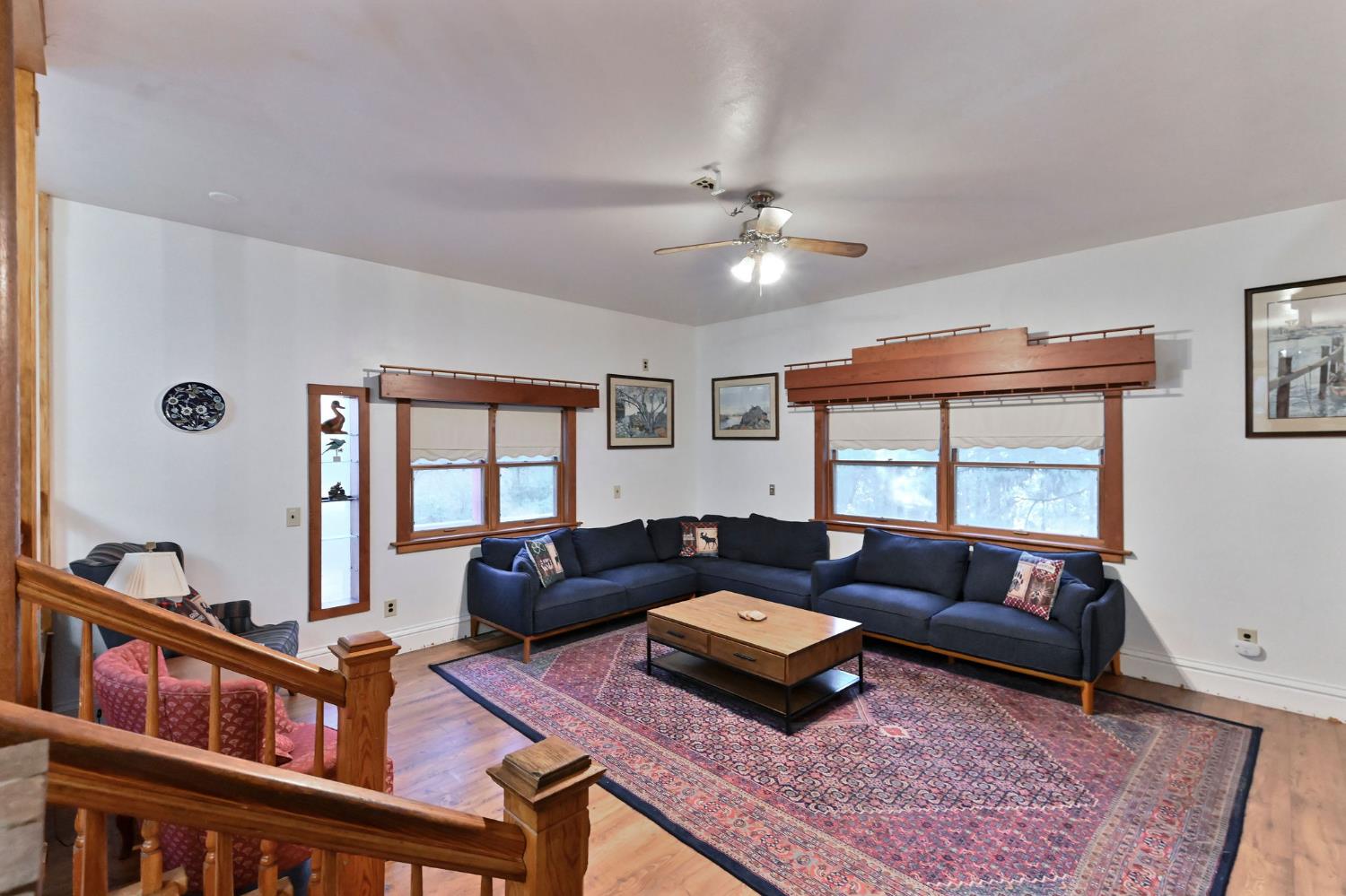 5276 Highway 4 Murphys, CA 95247 - Photo 16 of 69 a living room with furniture hard wood floor and a window