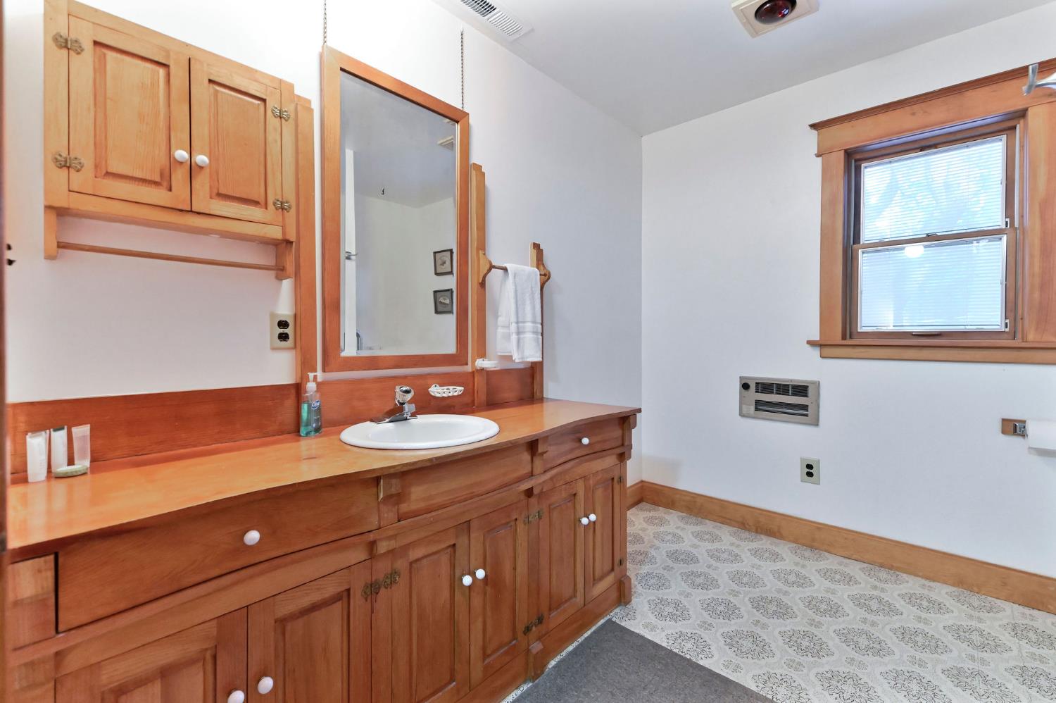 5276 Highway 4 Murphys, CA 95247 - Photo 50 of 69 a bathroom with a sink double vanity and a mirror