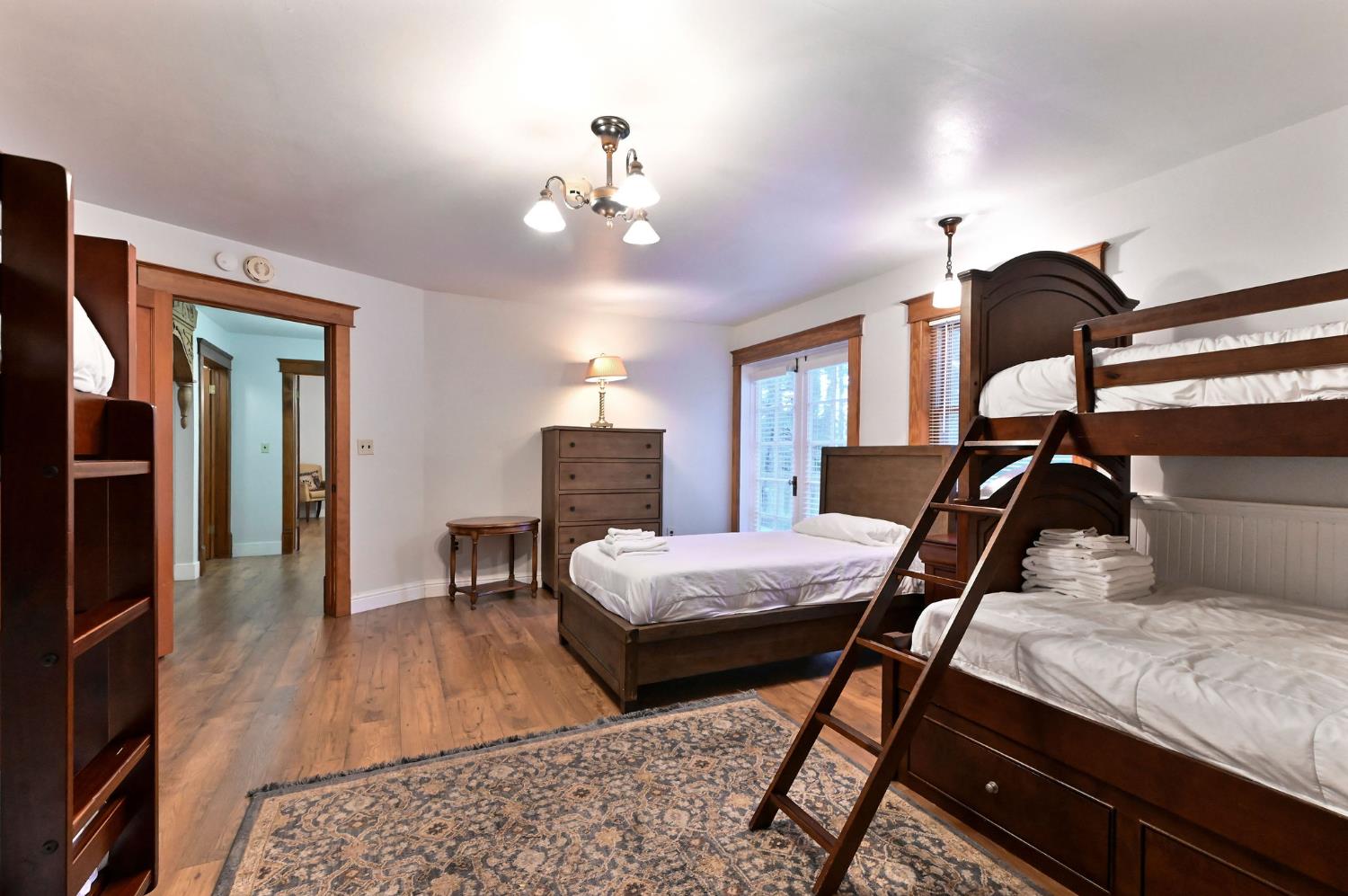 5276 Highway 4 Murphys, CA 95247 - Photo 53 of 69 a bedroom with bed and wooden floor