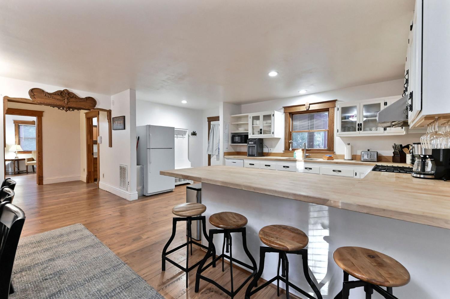 5276 Highway 4 Murphys, CA 95247 - Photo 10 of 69 a kitchen with stainless steel appliances a sink and a refrigerator
