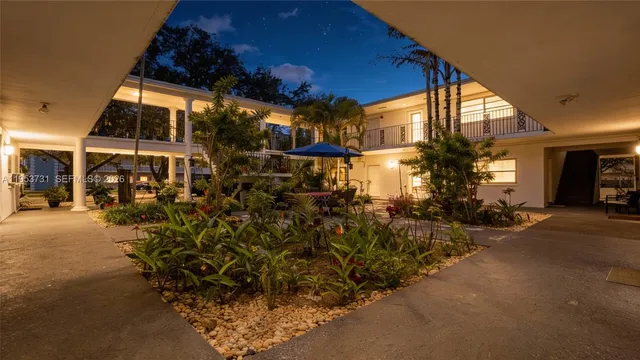 a view of a street with sitting area