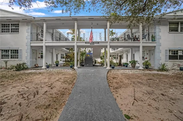 a view of a building with a street