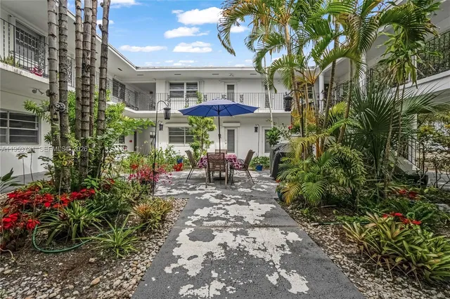 a view of a chairs and tables in the patio