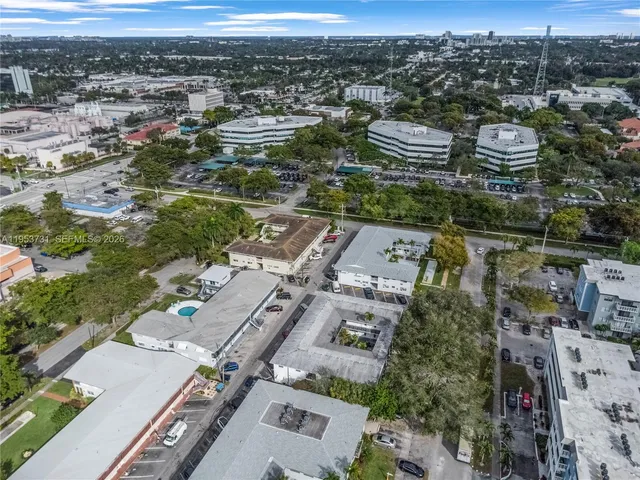 an aerial view of a city with lots of residential buildings