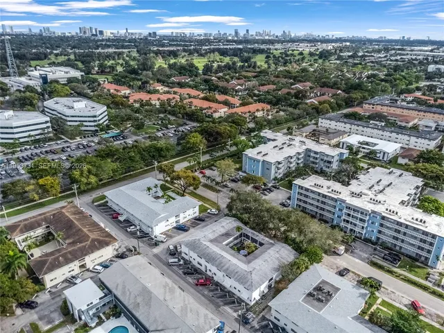 an aerial view of a city with lots of residential buildings