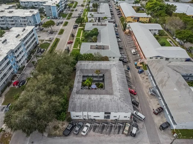 an aerial view of a house with outdoor space