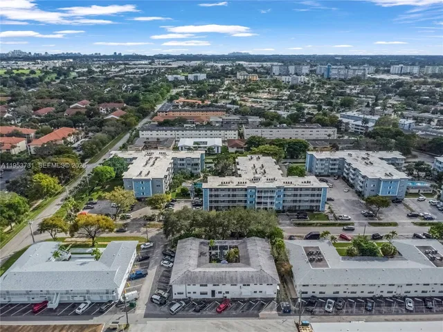 an aerial view of a city with lots of residential buildings