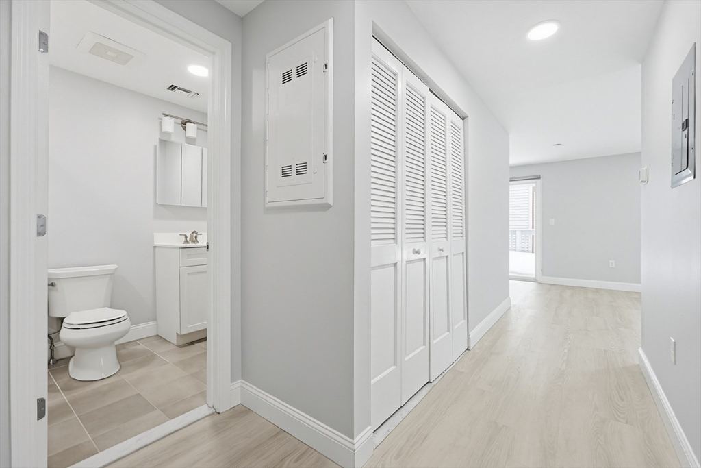 212 Franklin Crossing Road, Unit 12 Franklin, MA 02038 - Photo 3 of 11 a bathroom with a toilet a sink and shower