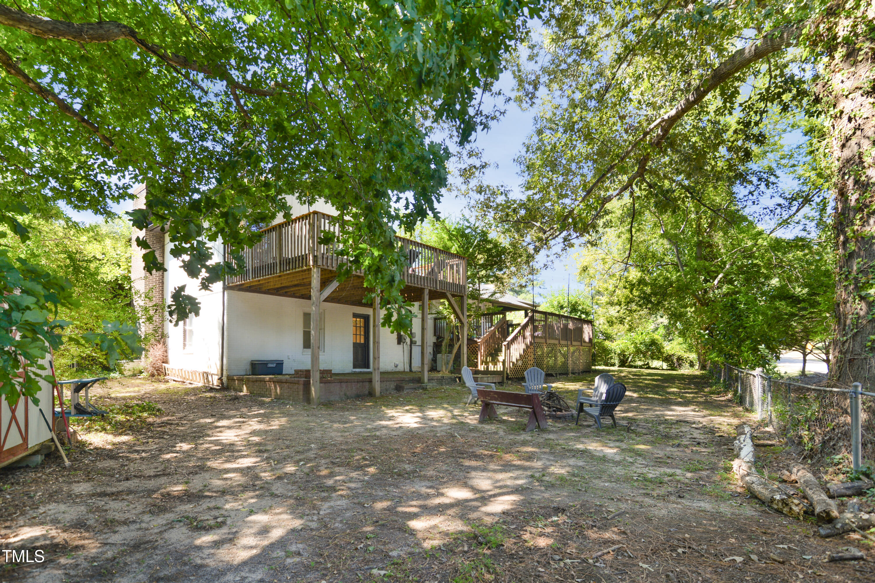 1421 Lions Way Raleigh, NC 27604 - Photo 22 of 22 a view of backyard with a table and chair