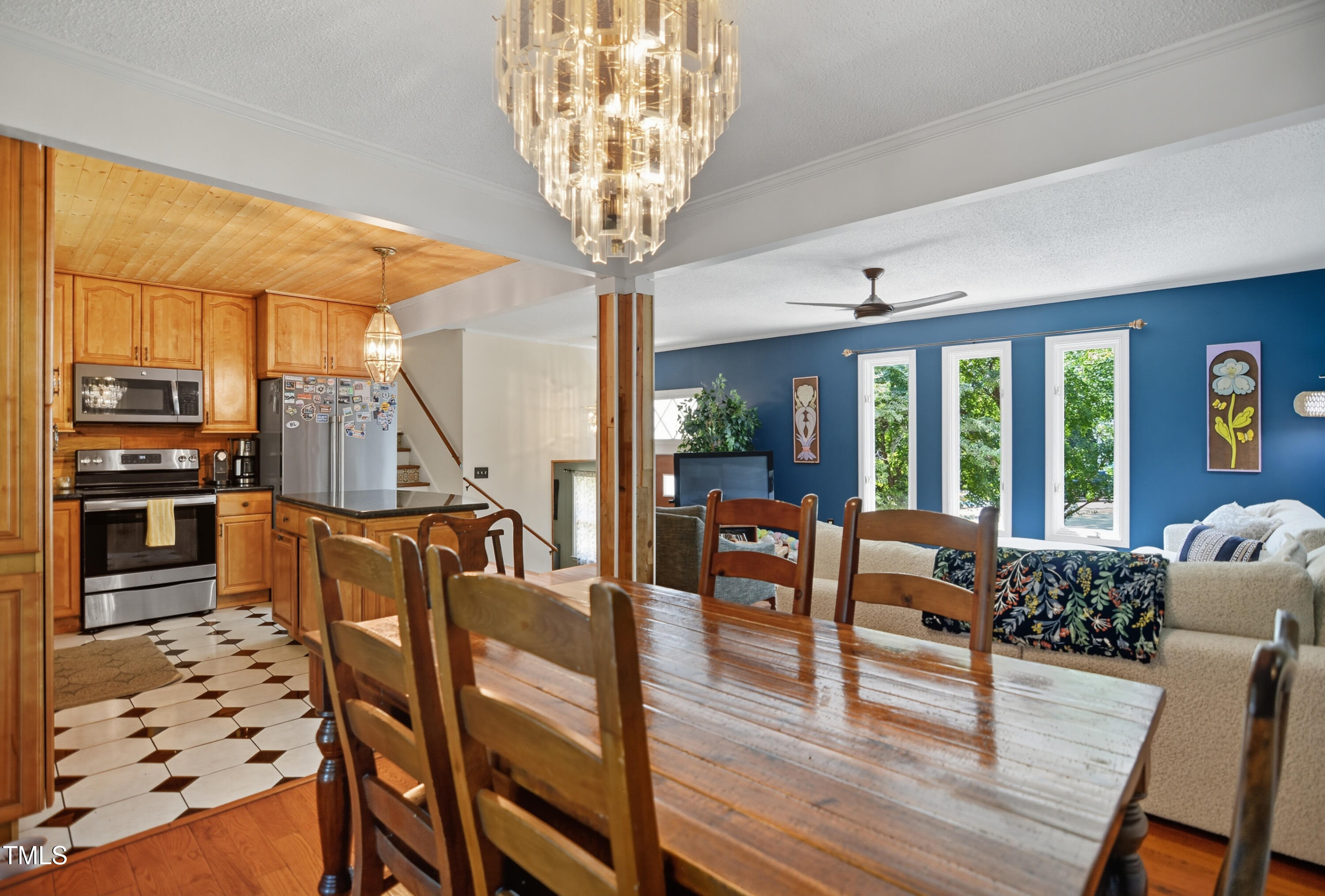 1421 Lions Way Raleigh, NC 27604 - Photo 6 of 22 a living room with furniture and wooden floor