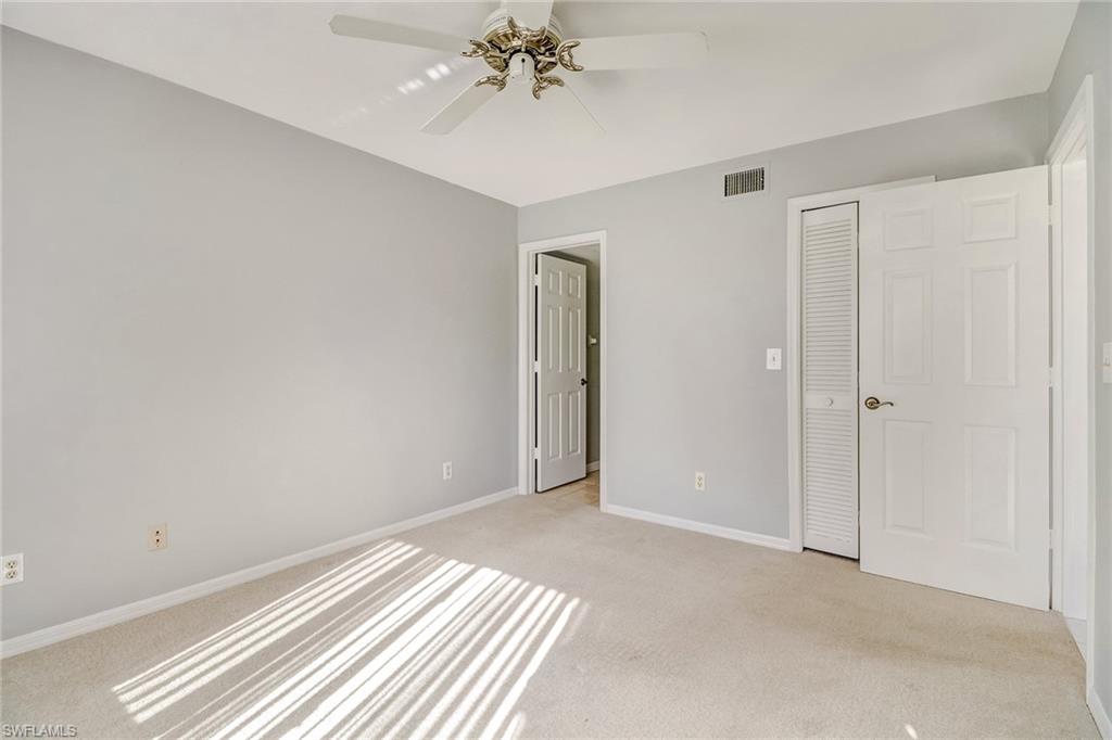 5809 Rattlesnake Hammock Road, Unit 102 Naples, FL 34113 - Photo 13 of 23 a view of an empty room