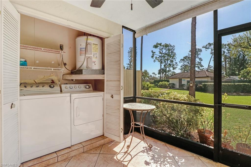 5809 Rattlesnake Hammock Road, Unit 102 Naples, FL 34113 - Photo 10 of 23 a view of a hallway with a view of living room