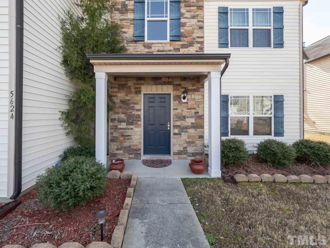 5624 Quitman Trail Raleigh, NC 27610 - Photo 3 of 25 a front view of a house with garden