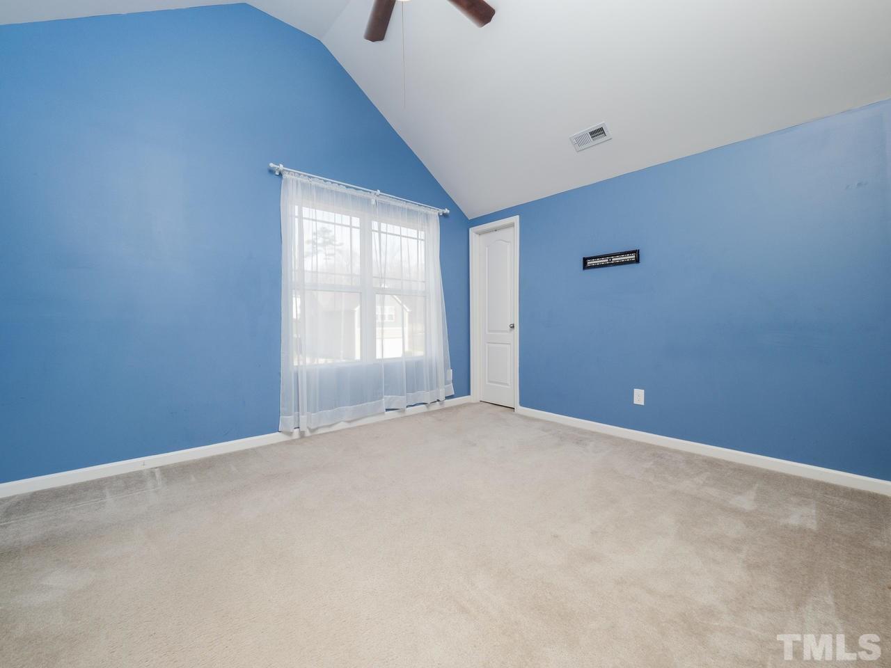 5624 Quitman Trail Raleigh, NC 27610 - Photo 22 of 25 an empty room with windows