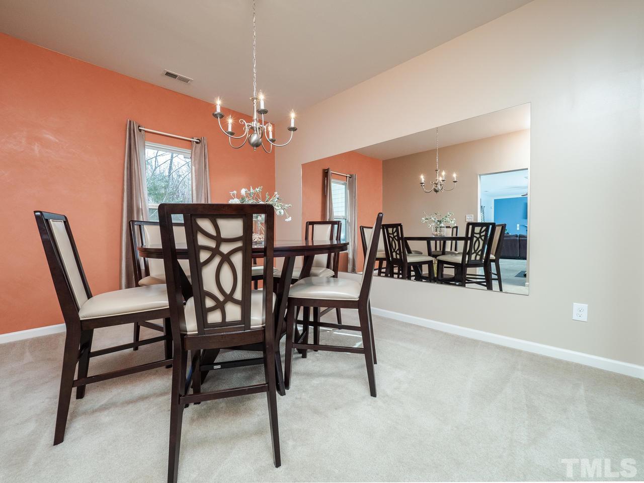 5624 Quitman Trail Raleigh, NC 27610 - Photo 8 of 25 a dining room with furniture and window