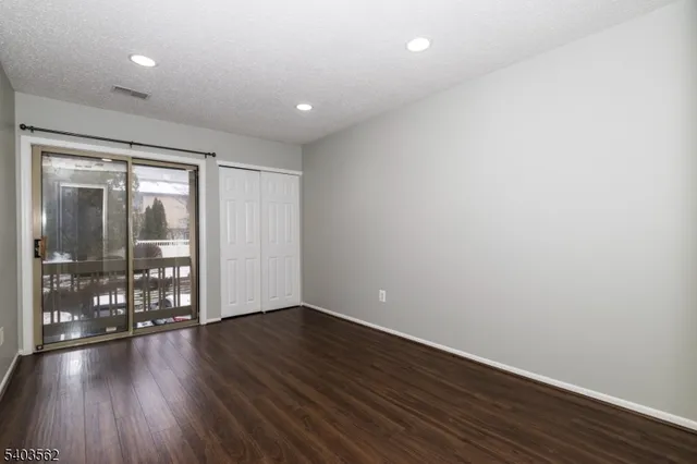 a bathroom with a sink toilet and a mirror