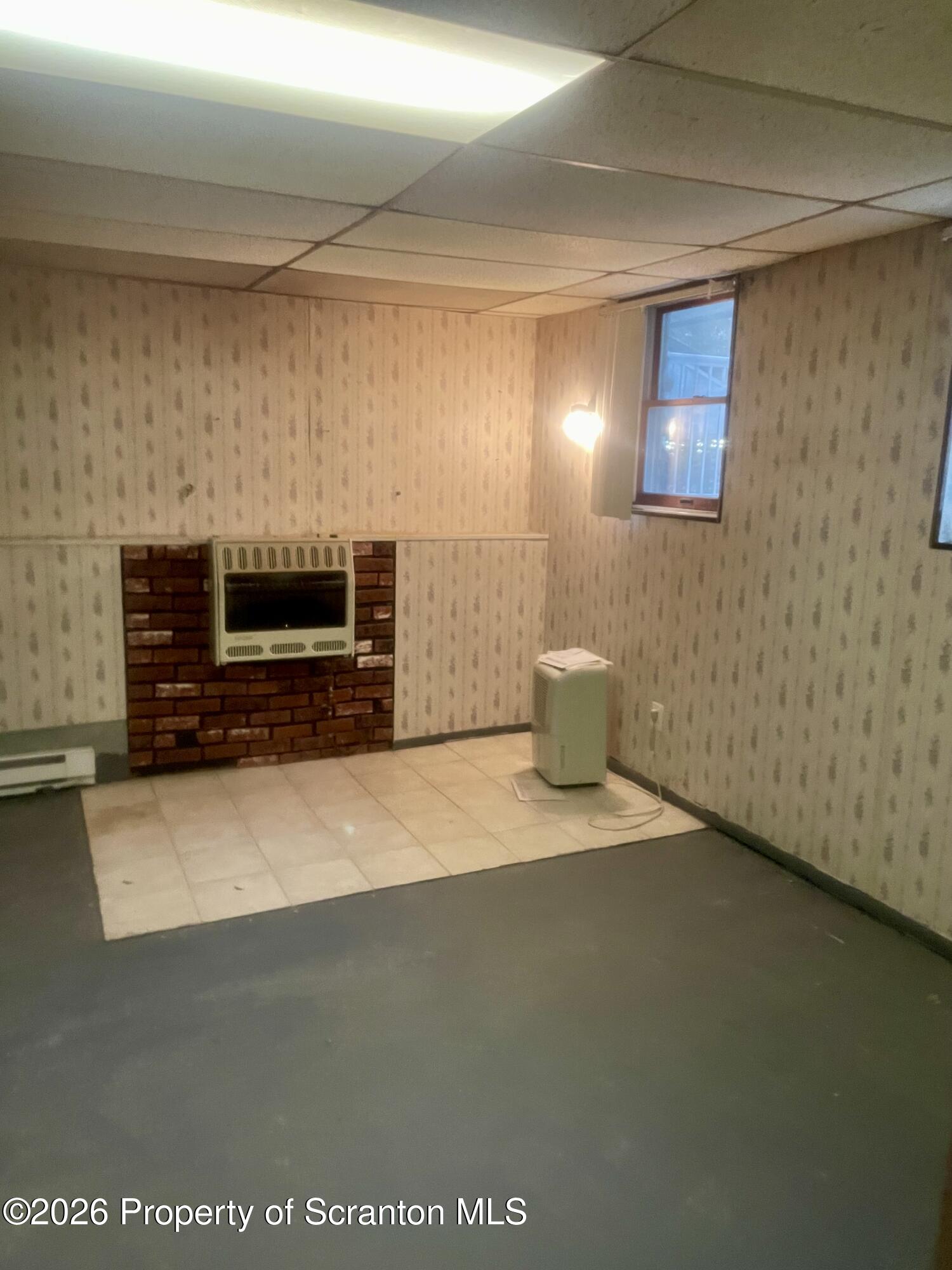 1677 Beaver Pond Road Clarks Summit, PA 18411 - Photo 13 of 21 a view of empty room with a fireplace