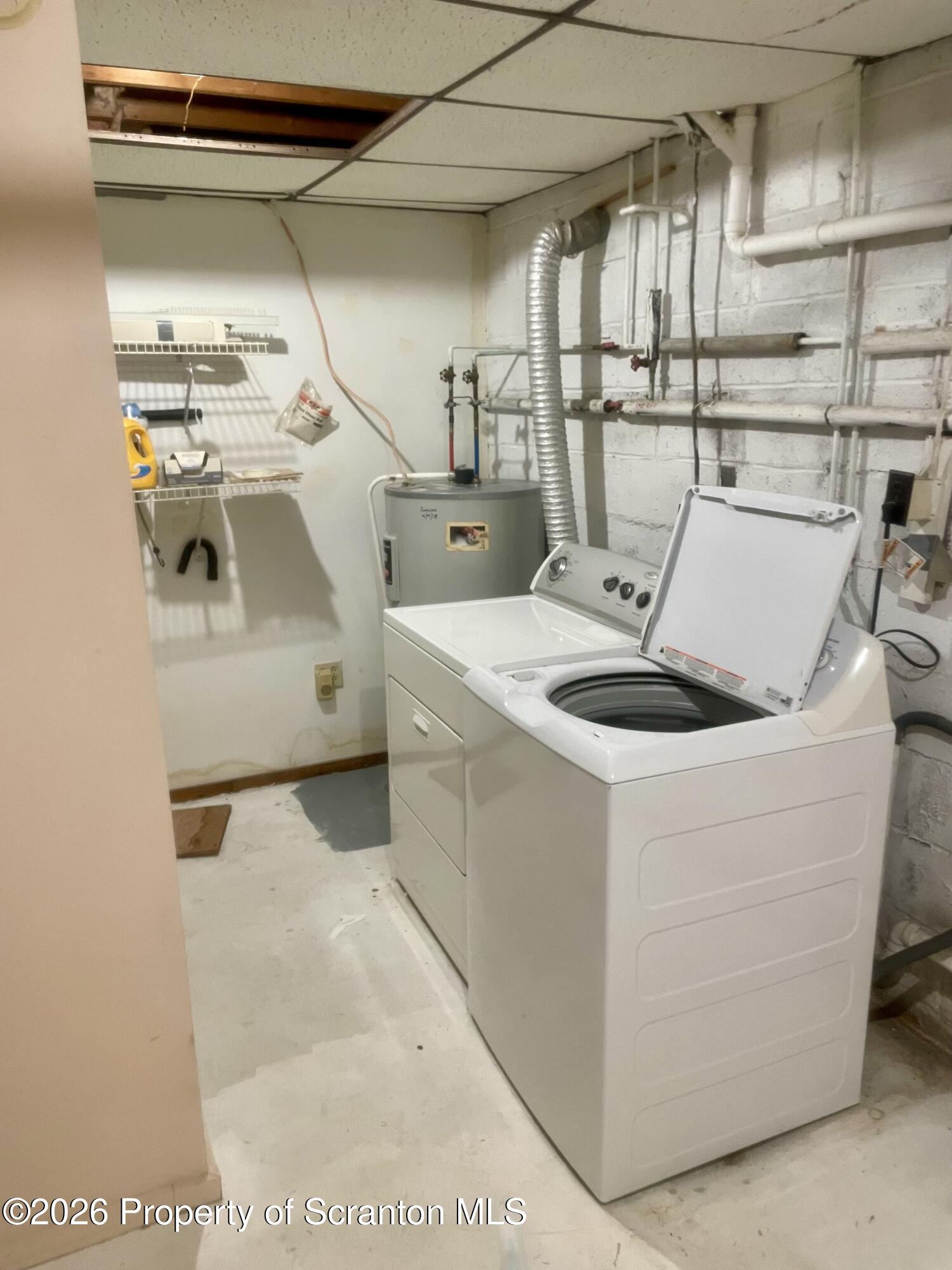 1677 Beaver Pond Road Clarks Summit, PA 18411 - Photo 16 of 21 a utility room with dryer and washer