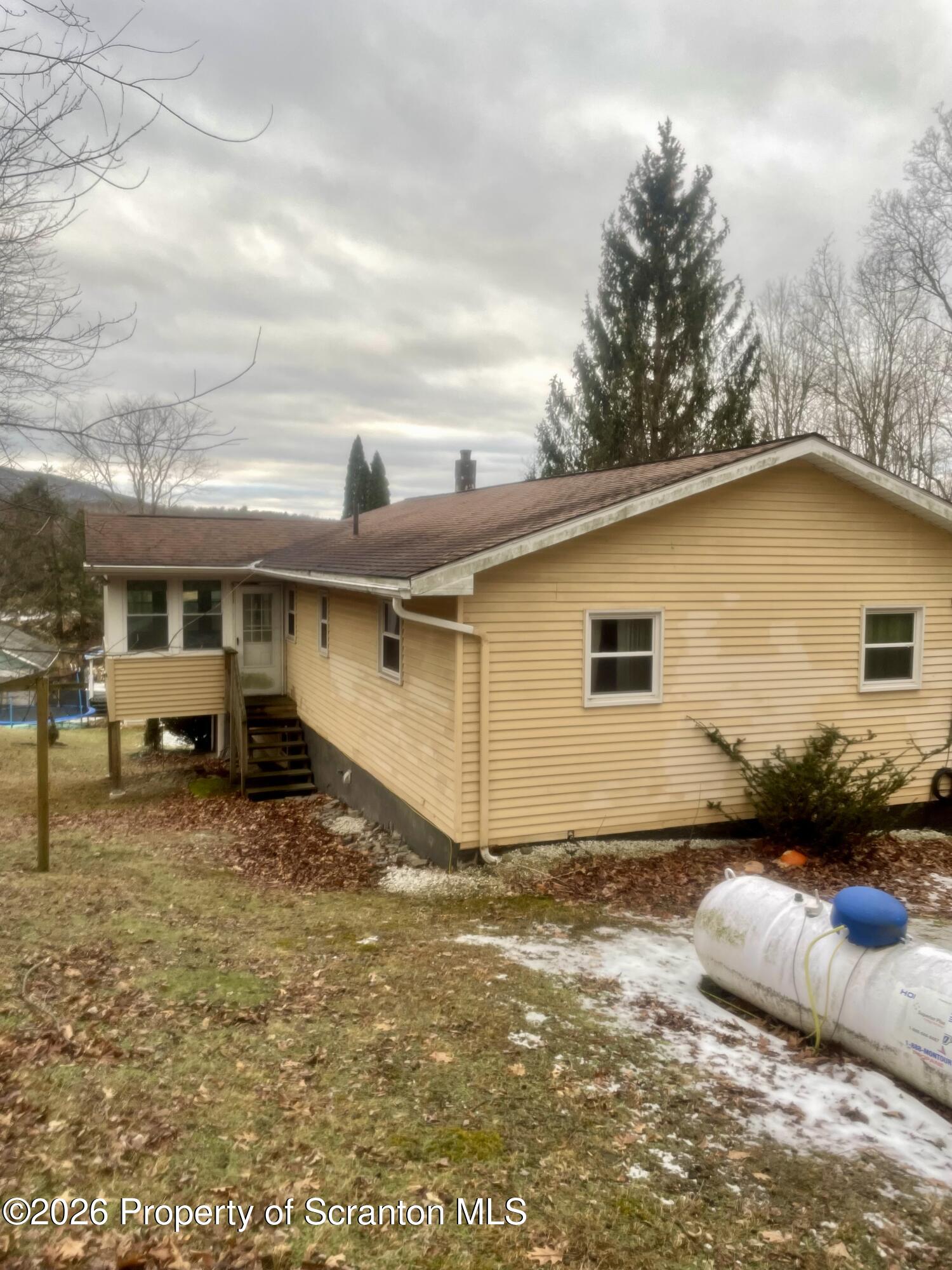 1677 Beaver Pond Road Clarks Summit, PA 18411 - Photo 21 of 21 a view of a house with backyard