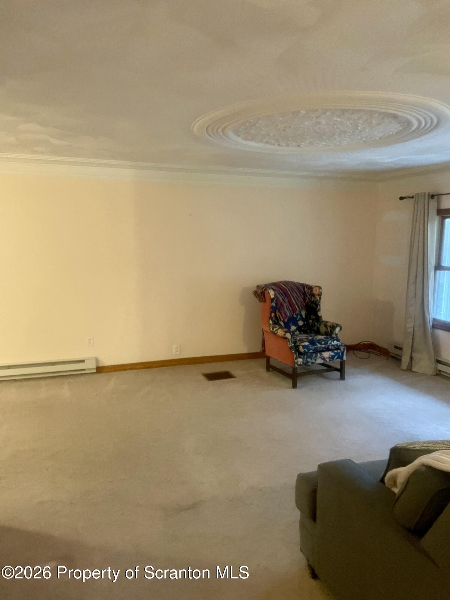 1677 Beaver Pond Road Clarks Summit, PA 18411 - Photo 3 of 21 a living room with furniture and a flat screen tv