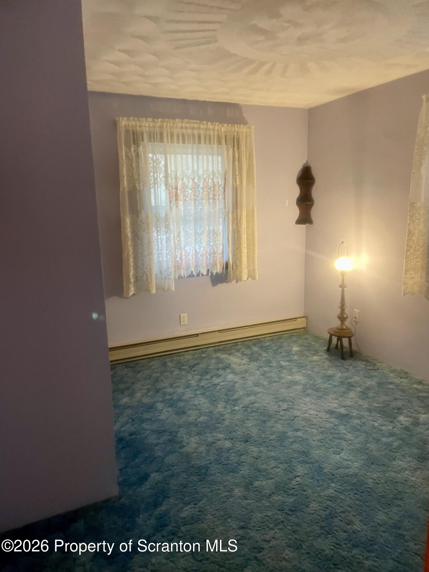 1677 Beaver Pond Road Clarks Summit, PA 18411 - Photo 10 of 21 an empty room with windows