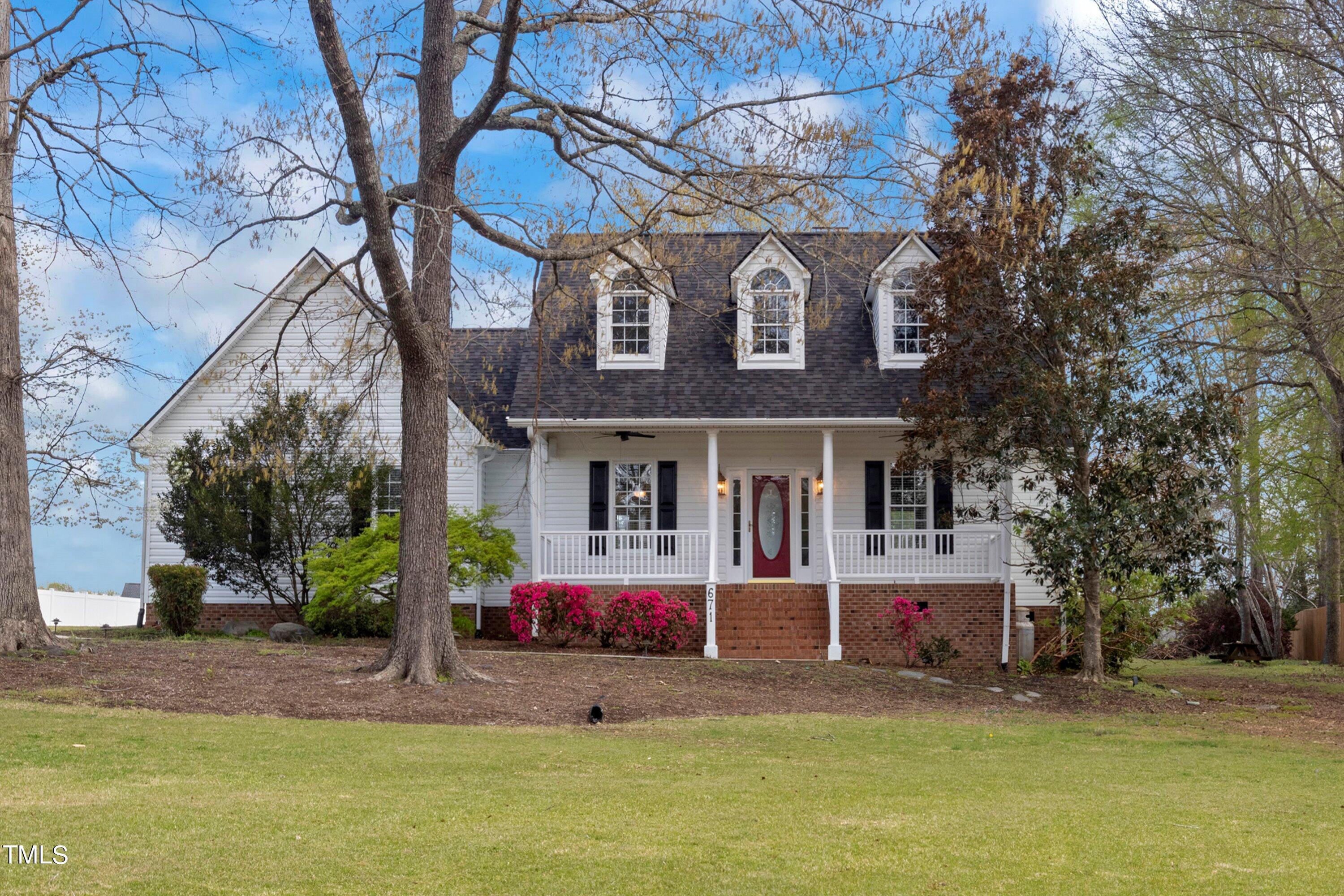 a front view of house with yard