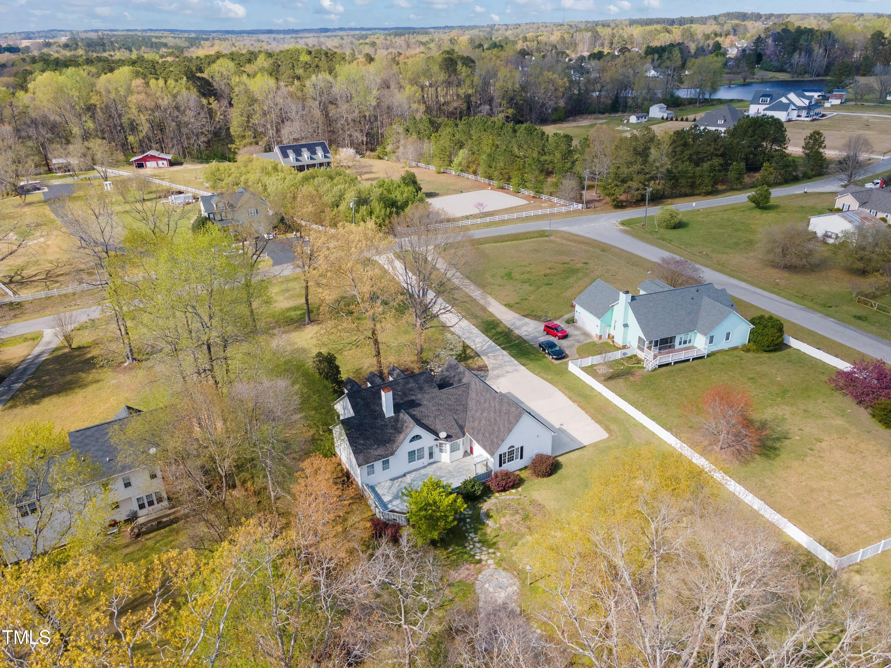 671 Old Evans Road Garner, NC 27529 - Photo 41 of 44 an aerial view of residential houses with outdoor space