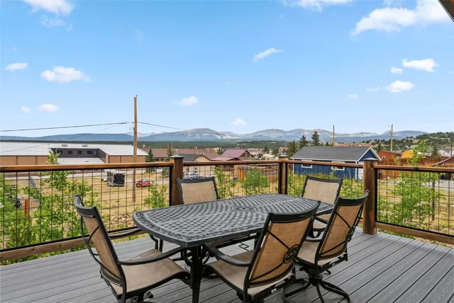 an aerial view of a house with a ocean view