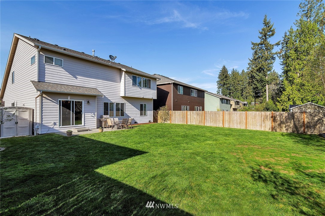 3124 172 Street Southeast Bothell, WA 98012 - Photo 2 of 25 a view of a house with backyard and porch