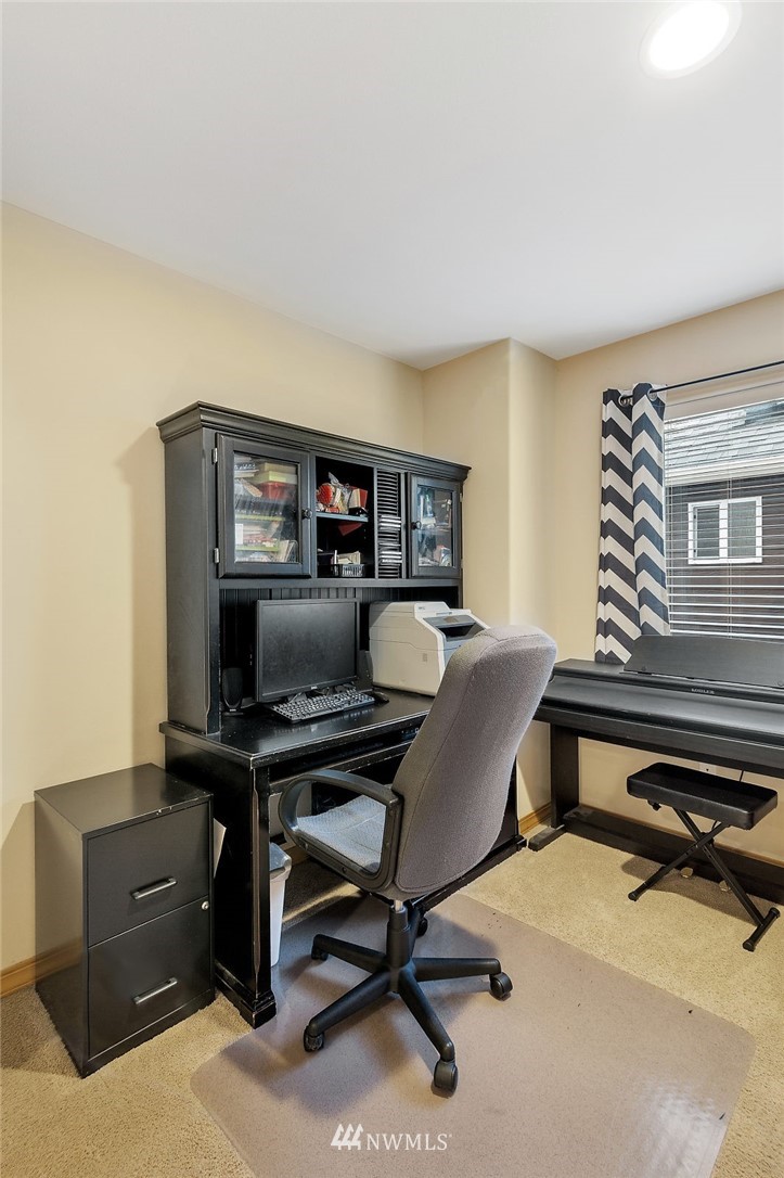 3124 172 Street Southeast Bothell, WA 98012 - Photo 20 of 25 a view of a workspace with furniture