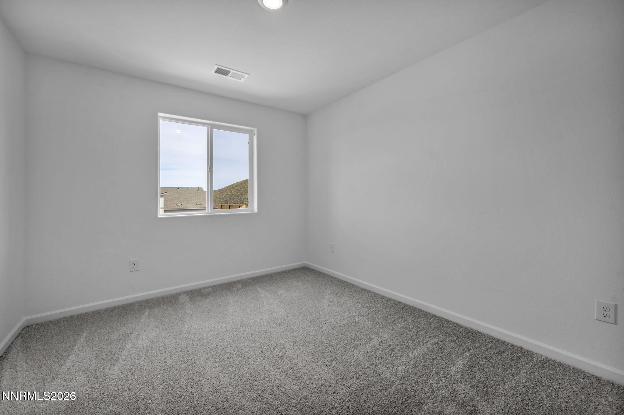 8500 Wicket Drive, Unit LOT 44 Reno, NV 89506 - Photo 13 of 31 an empty room with a window