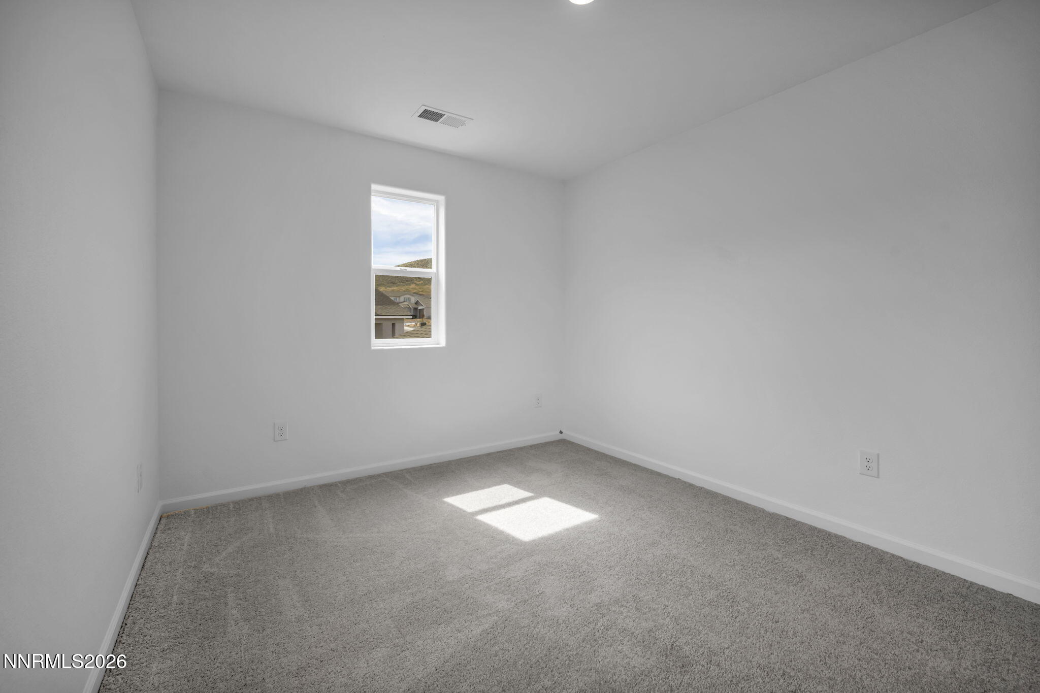 8500 Wicket Drive, Unit LOT 44 Reno, NV 89506 - Photo 15 of 31 an empty room with a window