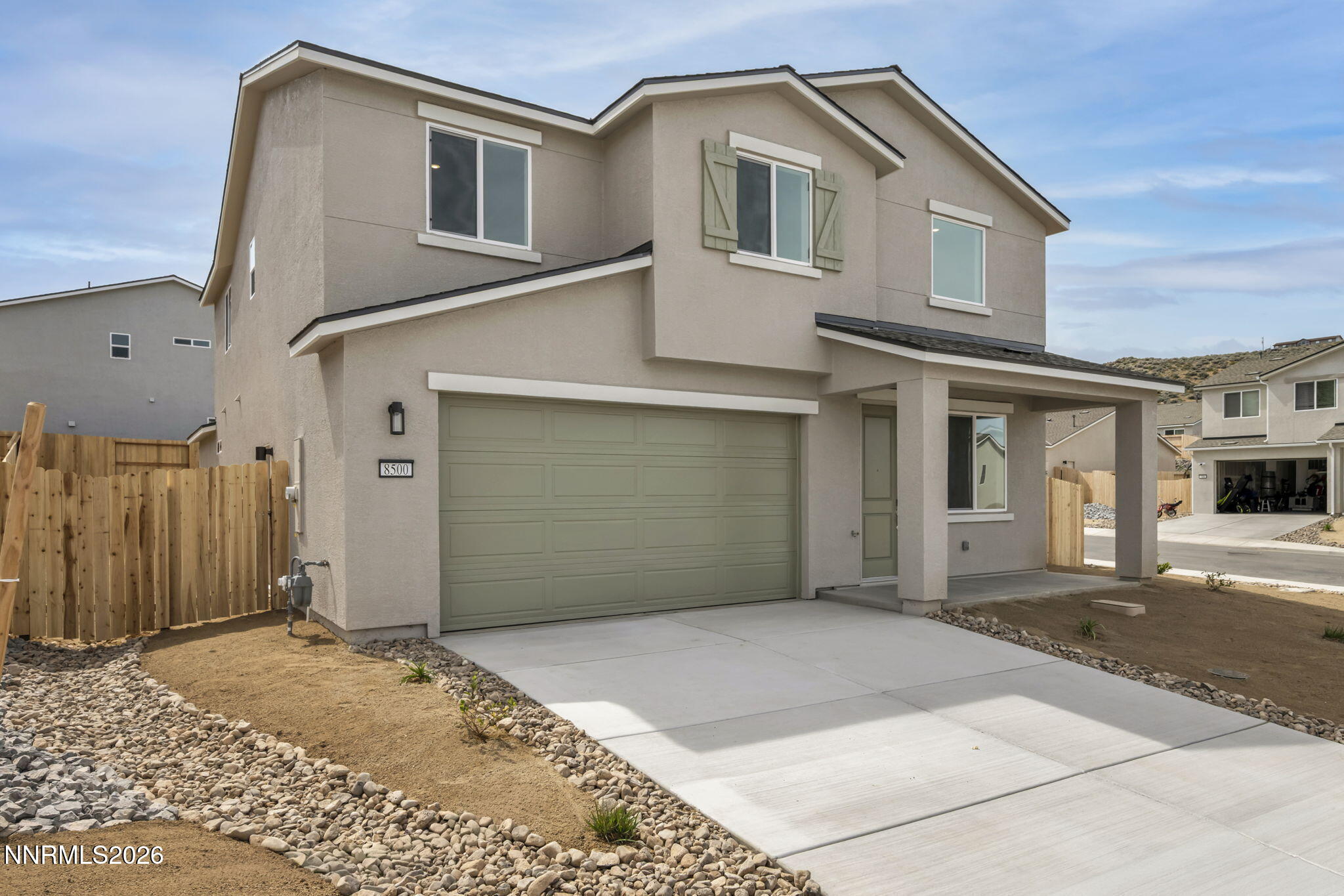 8500 Wicket Drive, Unit LOT 44 Reno, NV 89506 - Photo 28 of 31 a front view of a house with a yard