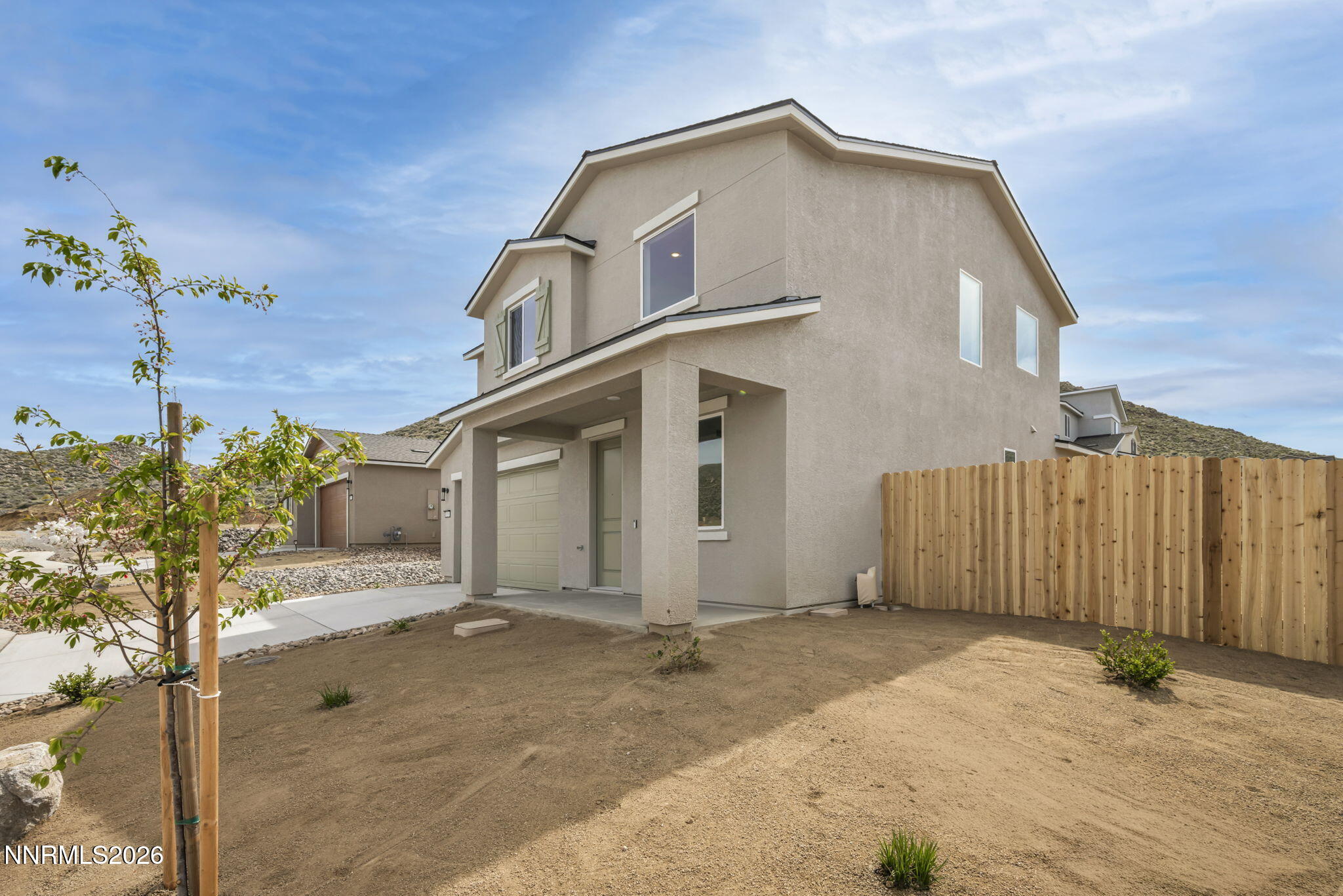 8500 Wicket Drive, Unit LOT 44 Reno, NV 89506 - Photo 29 of 31 a front view of a house with a yard