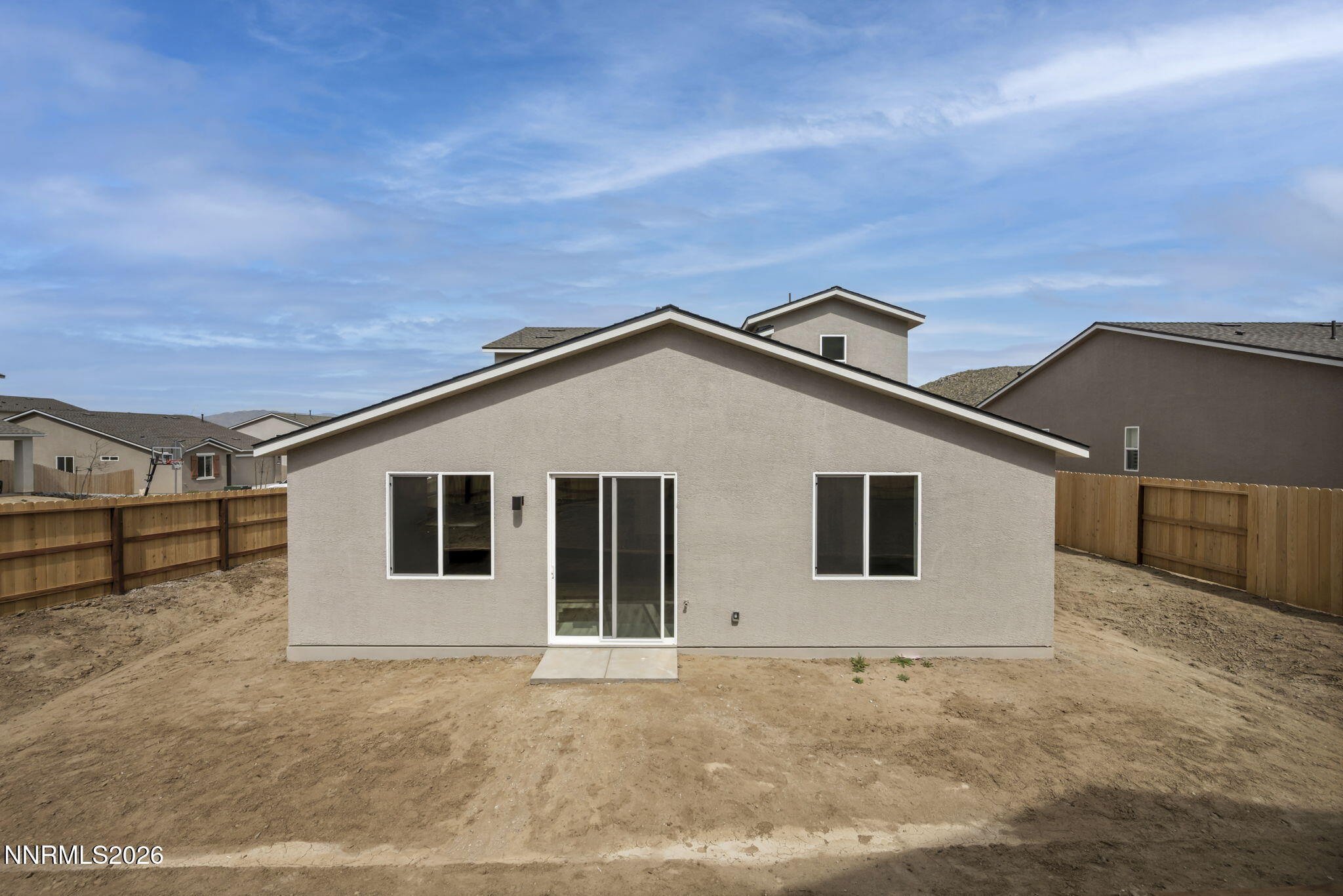 8500 Wicket Drive, Unit LOT 44 Reno, NV 89506 - Photo 30 of 31 a view of a house with a garage