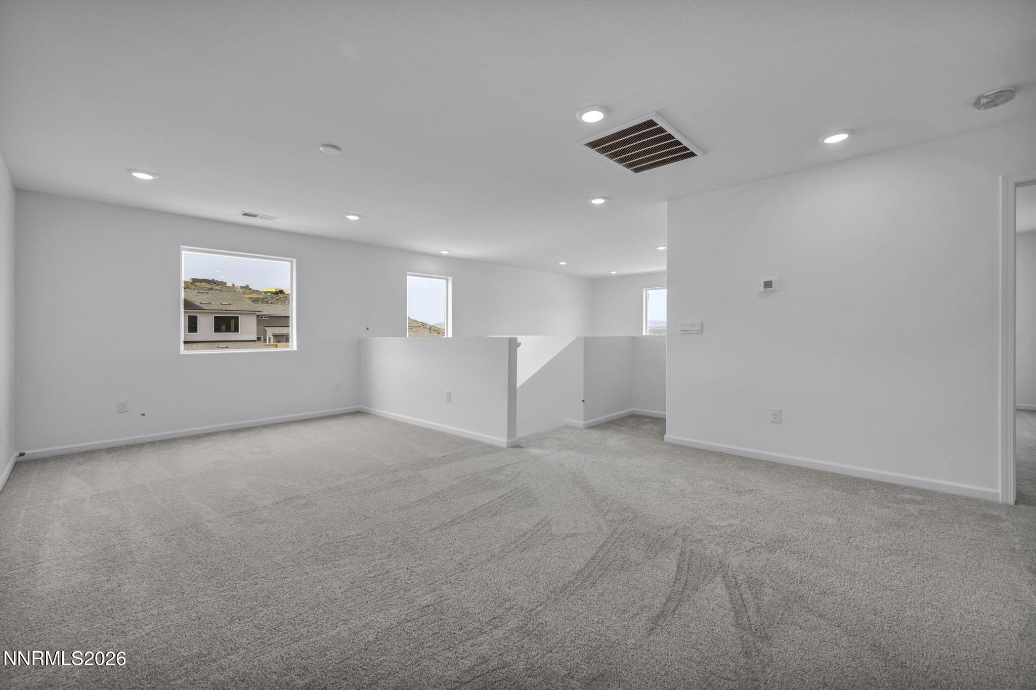 8500 Wicket Drive, Unit LOT 44 Reno, NV 89506 - Photo 9 of 31 a view of an empty room with a window