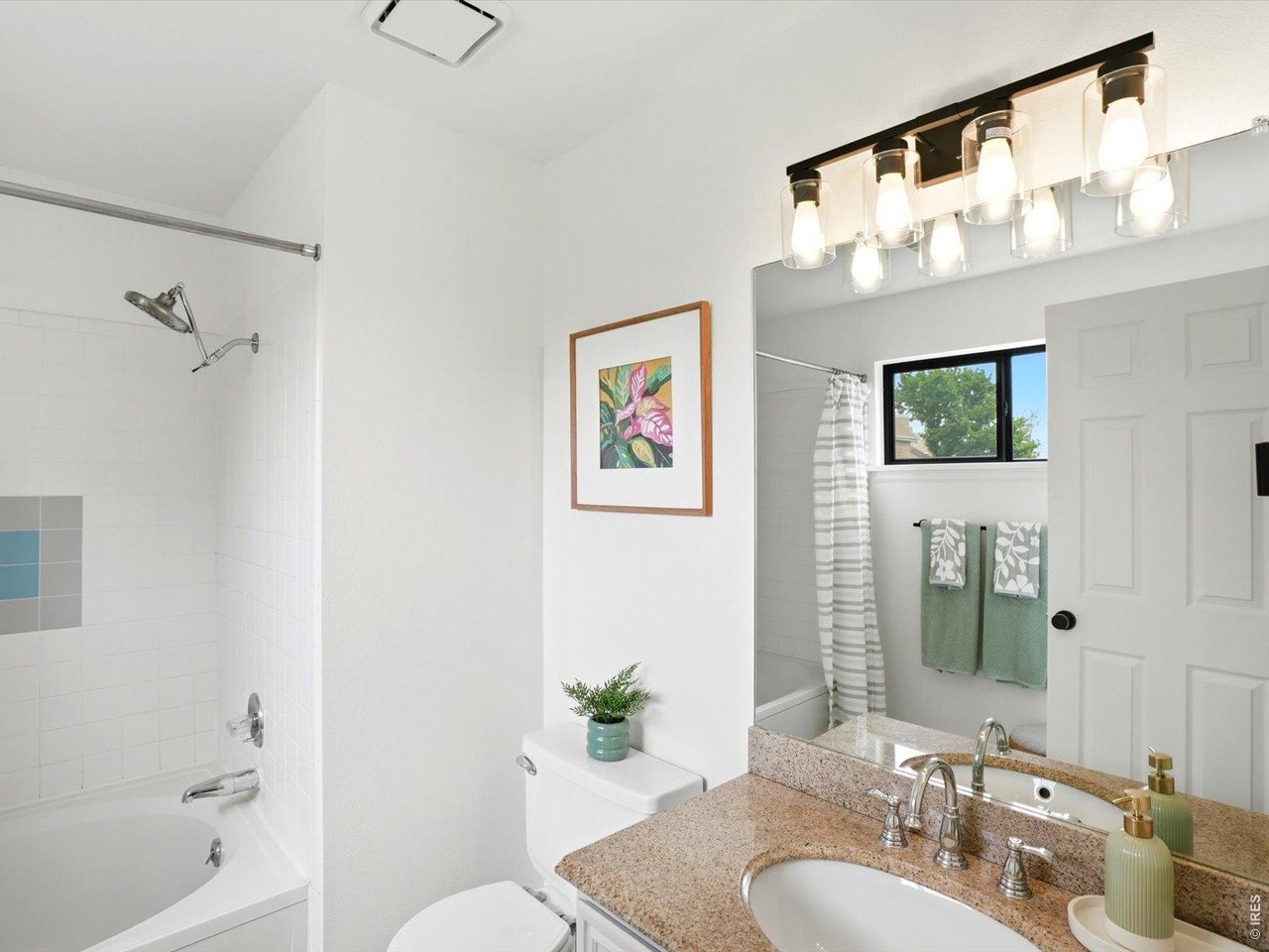 4945 Twin Lakes Road, Unit 46 Boulder, CO 80301 - Photo 28 of 42 The private ensuite bath offers abundant counter space and a functional layout for daily living.