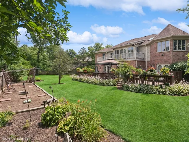a view of a house with a garden