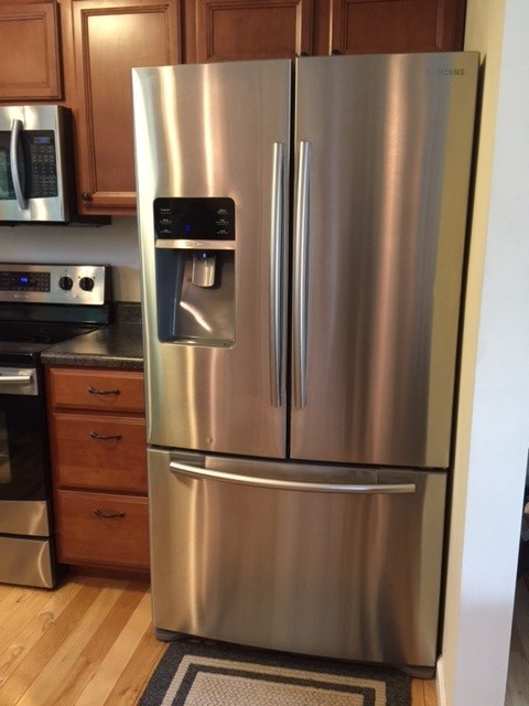 49 Stubblefield Road Waynesboro, VA 22980 - Photo 8 of 17 a metallic refrigerator freezer sitting in a kitchen