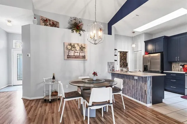 a table and chairs in a kitchen