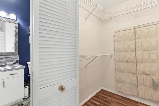 a bathroom with a shower and a sink