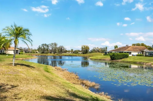 a view of a lake with houses