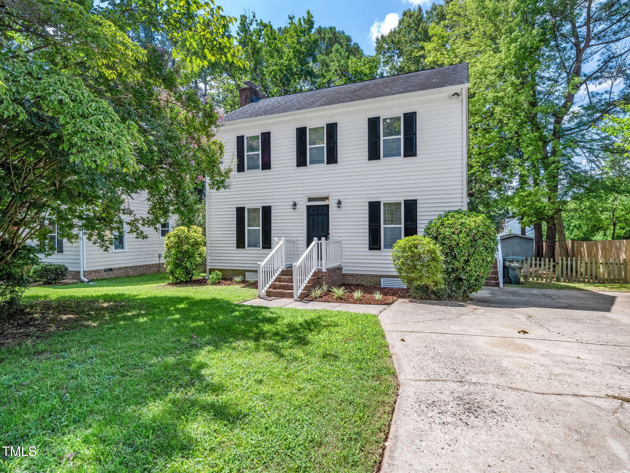 3909 Iron Horse Road Raleigh, NC 27616 - Photo 1 of 47 a front view of a house with a yard