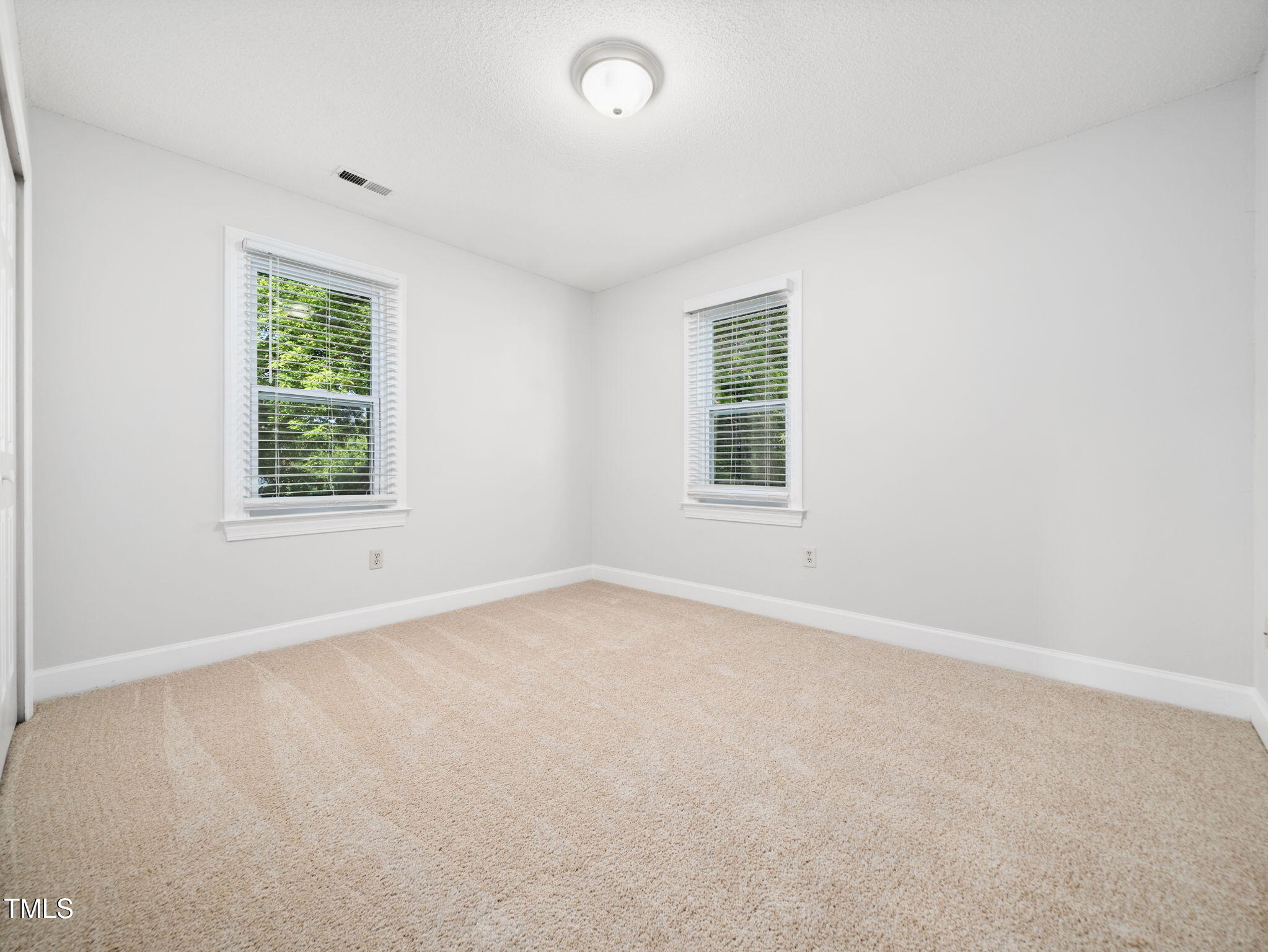 3909 Iron Horse Road Raleigh, NC 27616 - Photo 36 of 47 an empty room with a window