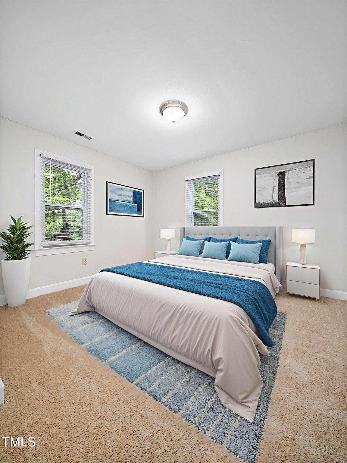 3909 Iron Horse Road Raleigh, NC 27616 - Photo 38 of 47 a bedroom with a large bed and a couch