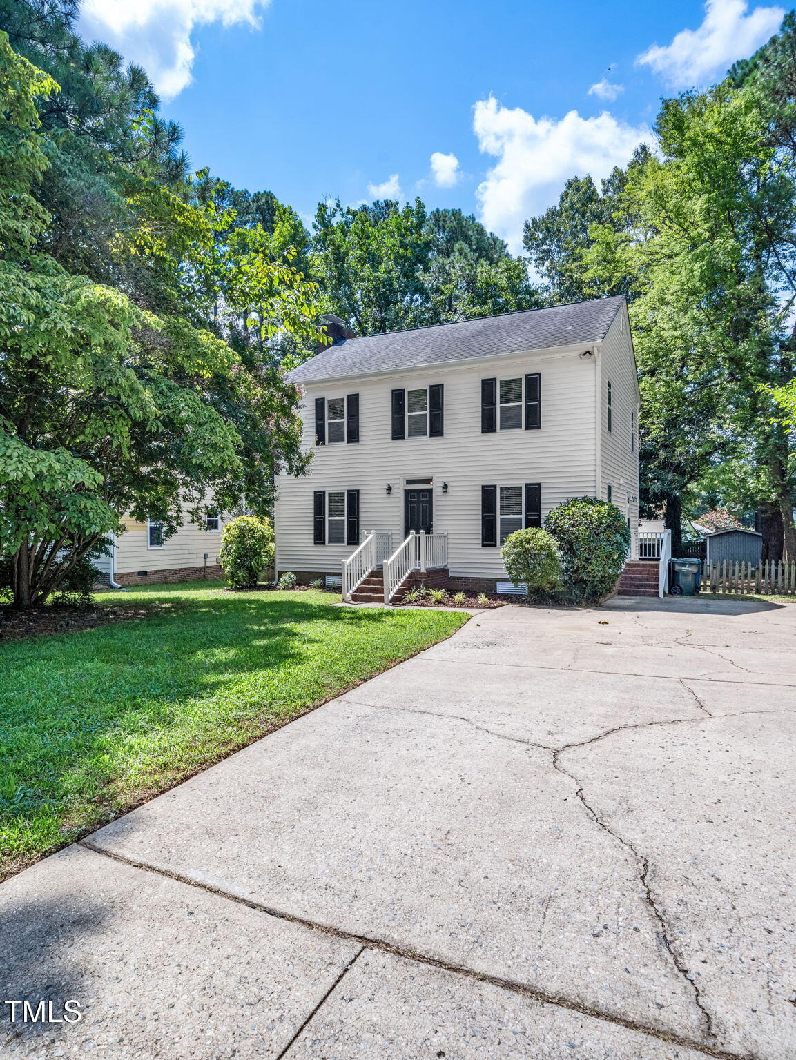 3909 Iron Horse Road Raleigh, NC 27616 - Photo 4 of 47 a front view of a house with garden